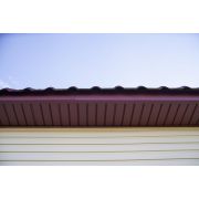 Софит металлический без перфорации 0,5 Satin Matt с пленкой RAL 8004 терракота